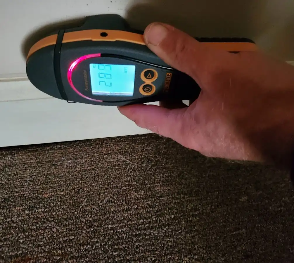 Moisture detection at baseboard during Storm Damage Restoration in Atascadero
